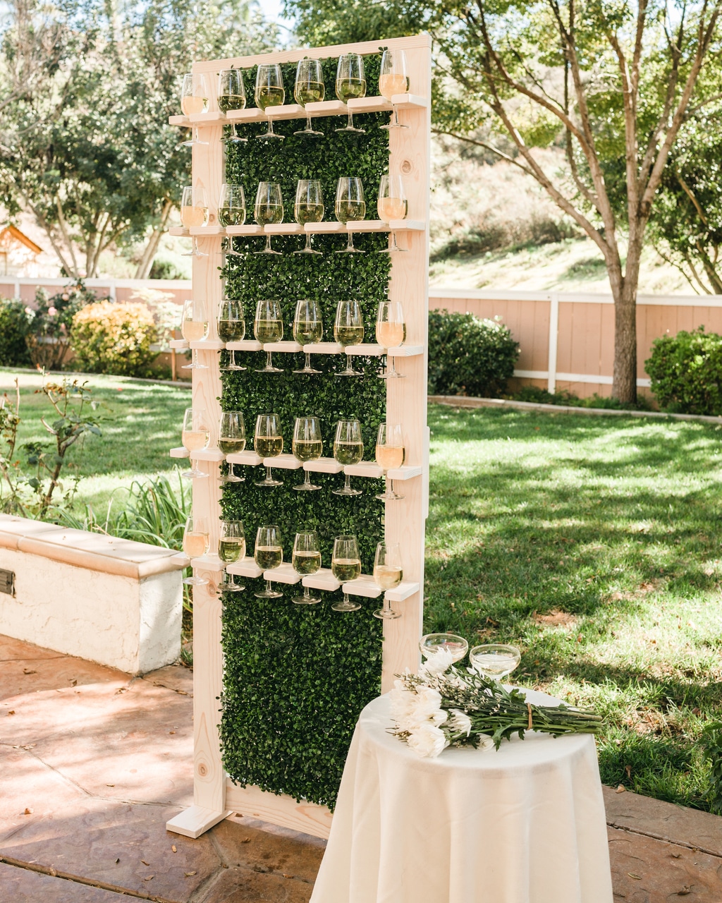 3′ x 7′ Wood & Greenery Wine/Champagne Wall | Rental