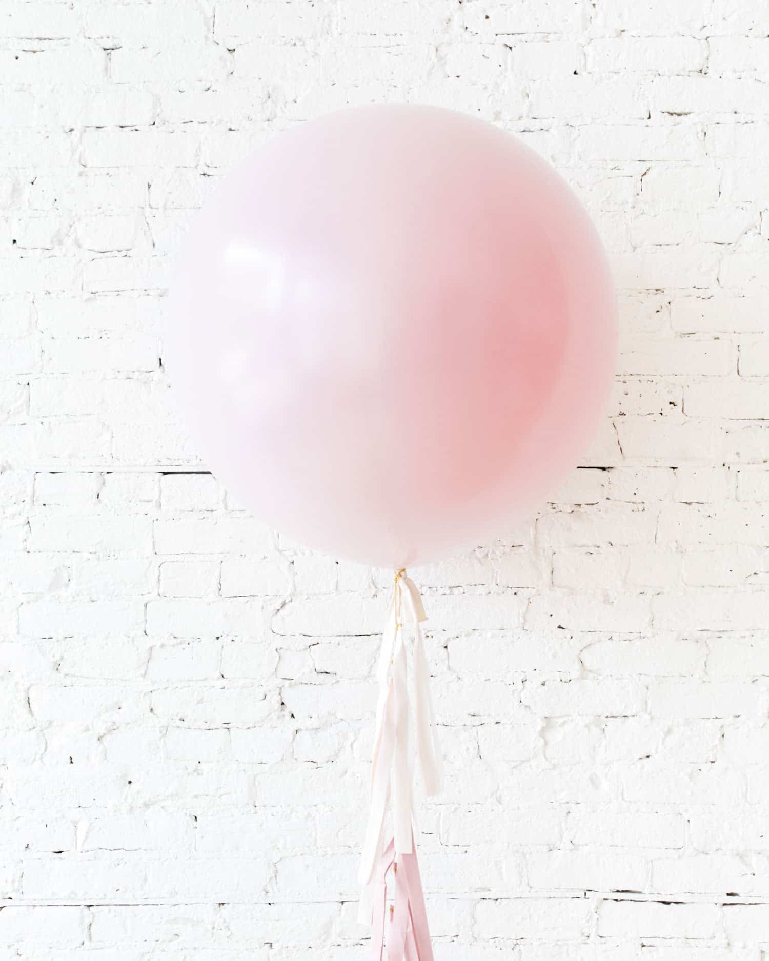 Pearl Light Rose Giant Balloon and Ombre Pink Tassel | Rental Pearl Light Rose Giant Balloon and Ombre Pink Tassel | Rental