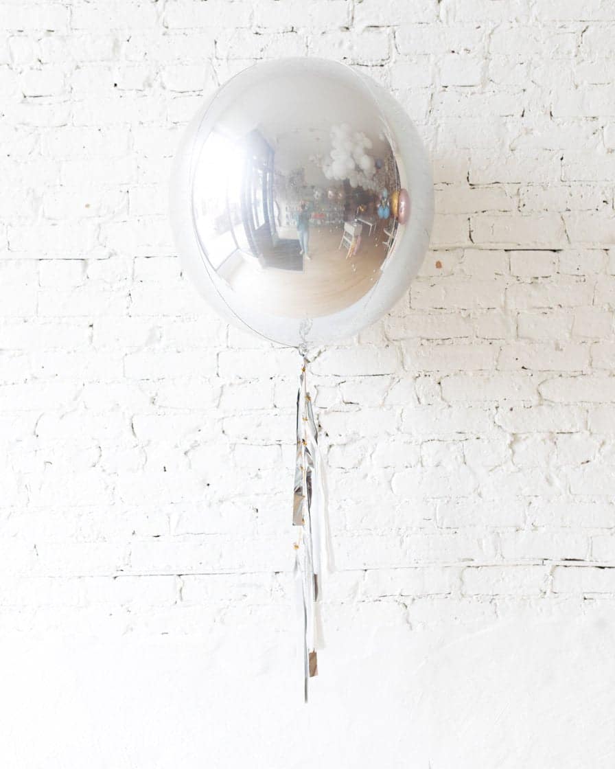 21in Silver Orb Foil Balloon and White, Grey & Silver Half-Tassel | Purchase