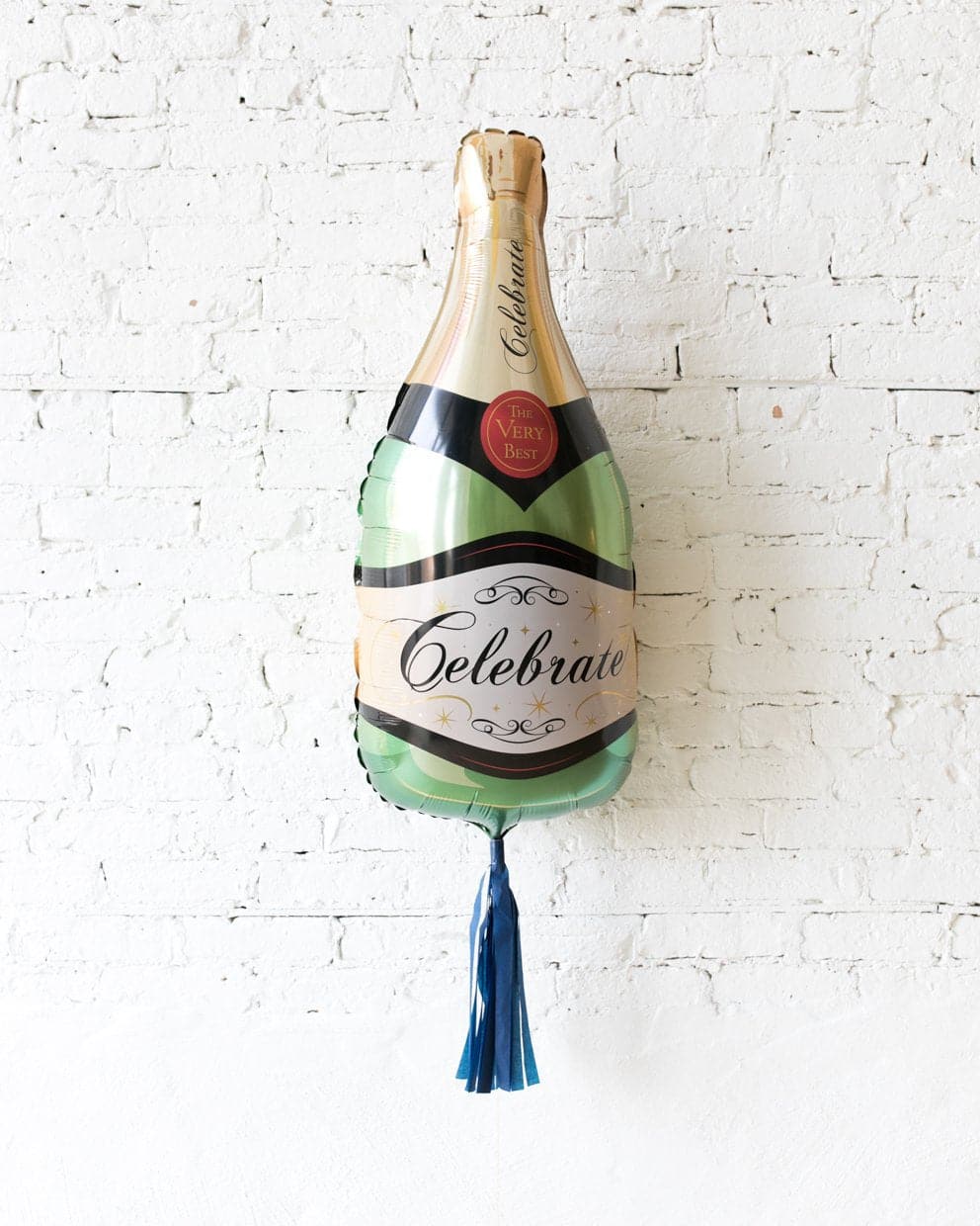 39in Classic Champagne Bottle Foil Balloon and Navy Skirt | Purchase